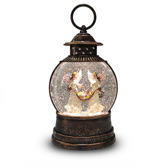 Farol navideño de bronce con cúpula de vidrio y escena del pesebre