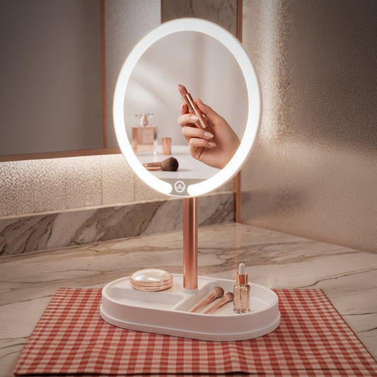 Espejo de maquillaje con luz LED SATE HZJ-602A, aro luminoso ovalado sobre base con bandeja, en un tocador