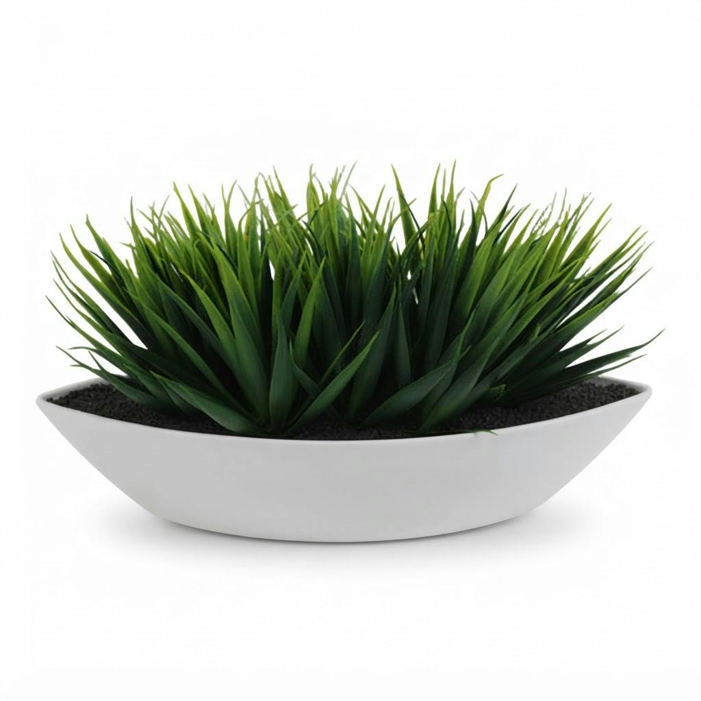 Planta artificial de pasto en maceta ovalada blanca 31,6 cm sobre fondo blanco