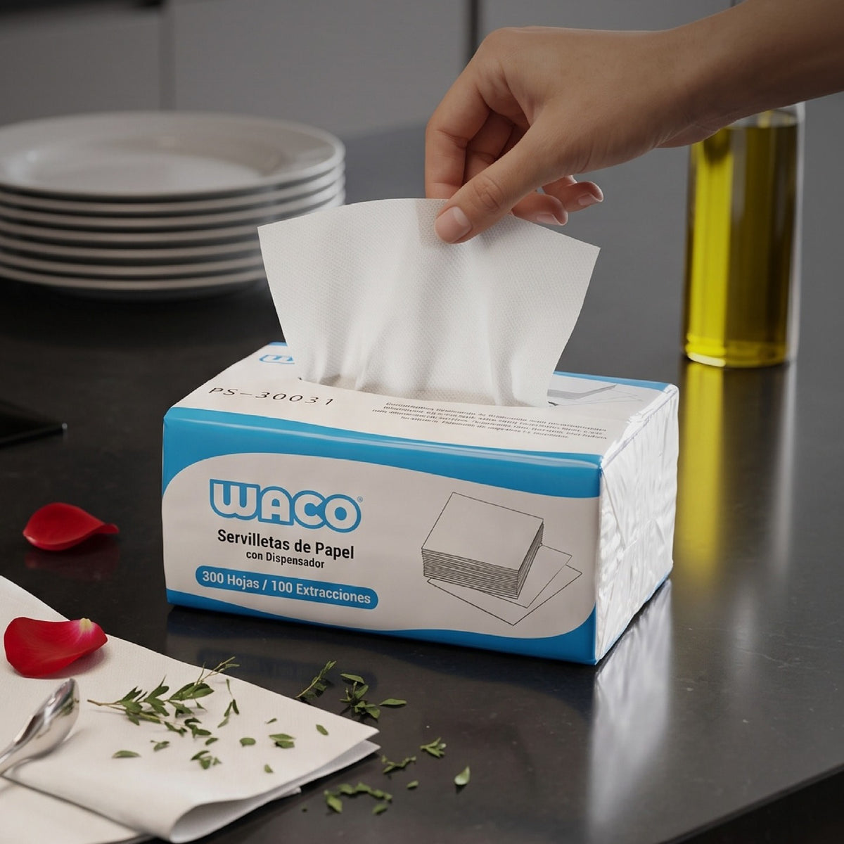 Caja dispensadora de servilletas de papel WACO PS-30031 de 300 hojas, con una mano sacando una servilleta